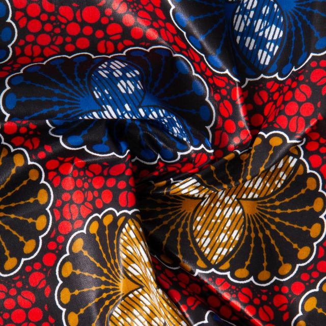 Tissu Wax africain n°607 sur fond Rouge