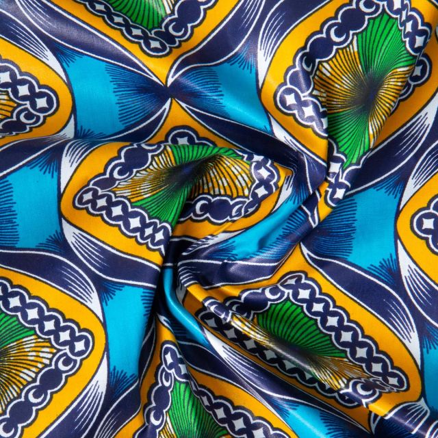 Tissu Wax africain n°627 sur fond Bleu turquoise