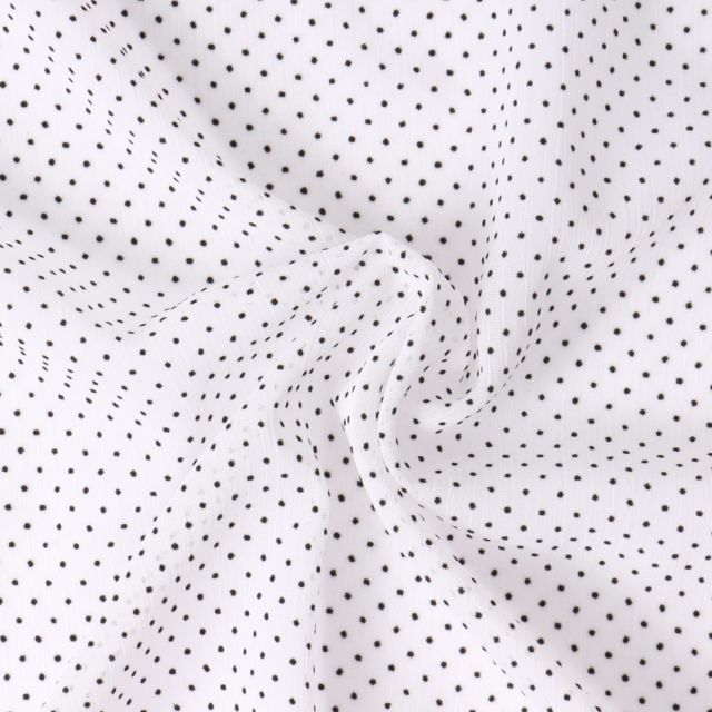 Tissu Mousseline  texturé Mini pois sur fond Blanc