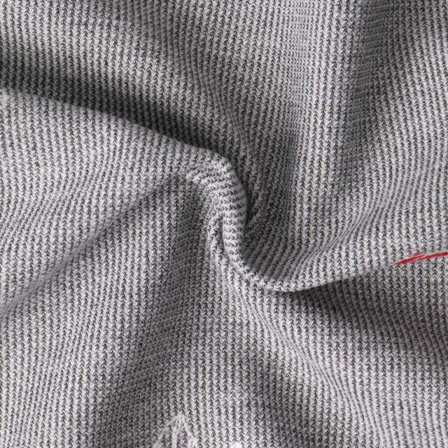 Tissu Maille Polyester Roses brodées sur fond Gris