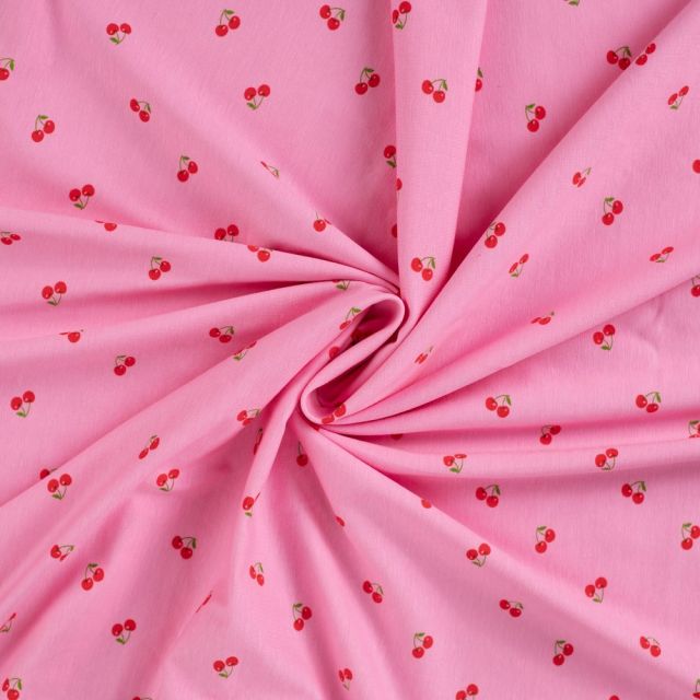 Tissu Jersey Coton imprimé Cerises rouges sur fond Rose