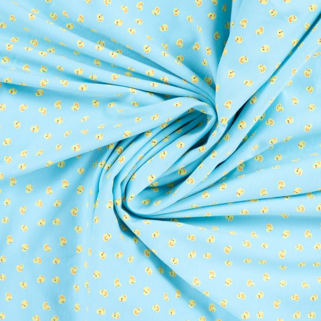 Tissus Jersey Coton imprimé Poussins jaunes sur fond Bleu turquoise