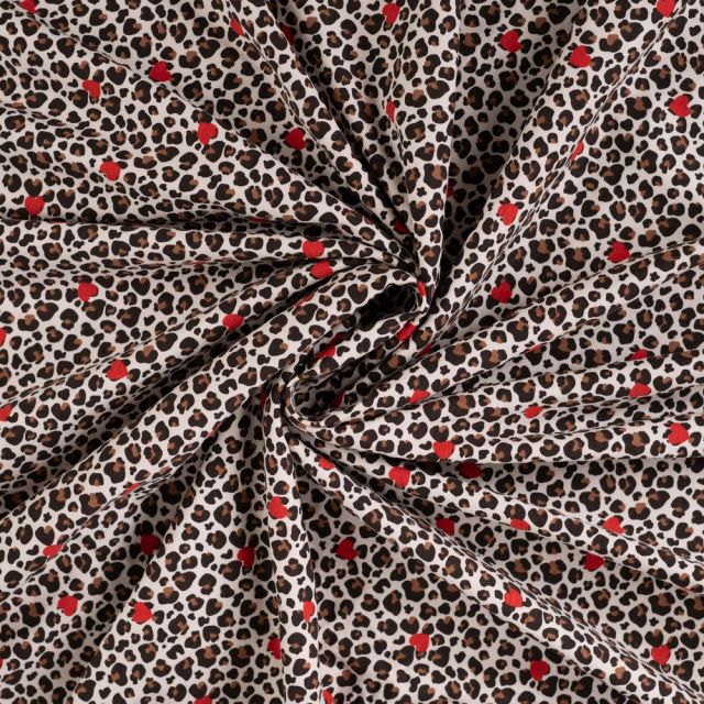 Tissus Jersey Coton imprimé Coeurs rouges et léopard sur fond Ecru