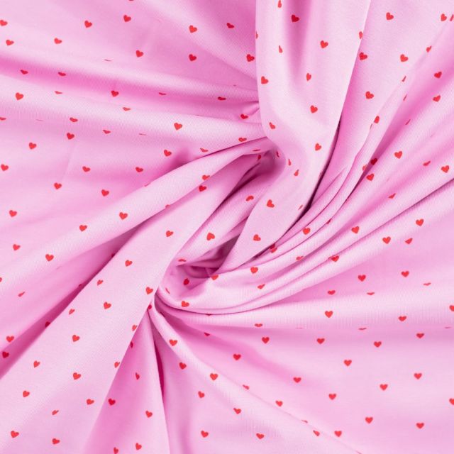 Tissu Jersey Coton Rosalie Petits coeurs framboise sur fond Rose bonbon