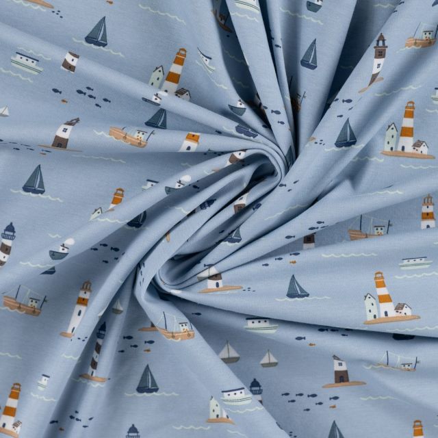Tissu Jersey Coton imprimé Eliott phares et bateaux sur fond Bleu ciel