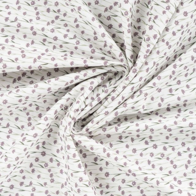 Tissu Popeline de Coton Petites fleurs lilas sur fond Blanc
