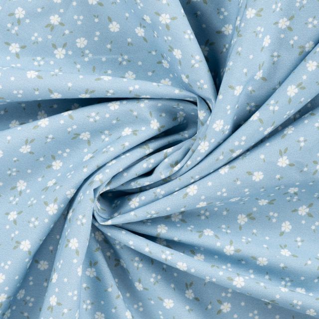 Tissu Popeline de Coton Charlotte petites fleurs sur fond Bleu ciel