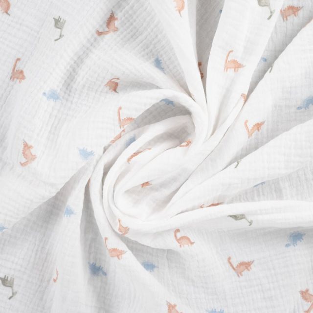 Tissu Double gaze de Coton Dinosaures sur fond Blanc cassé