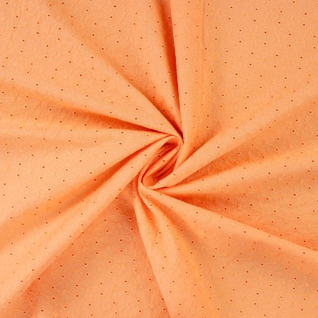 Tissu Coton brodé ajouré Fleuris sur fond Orange