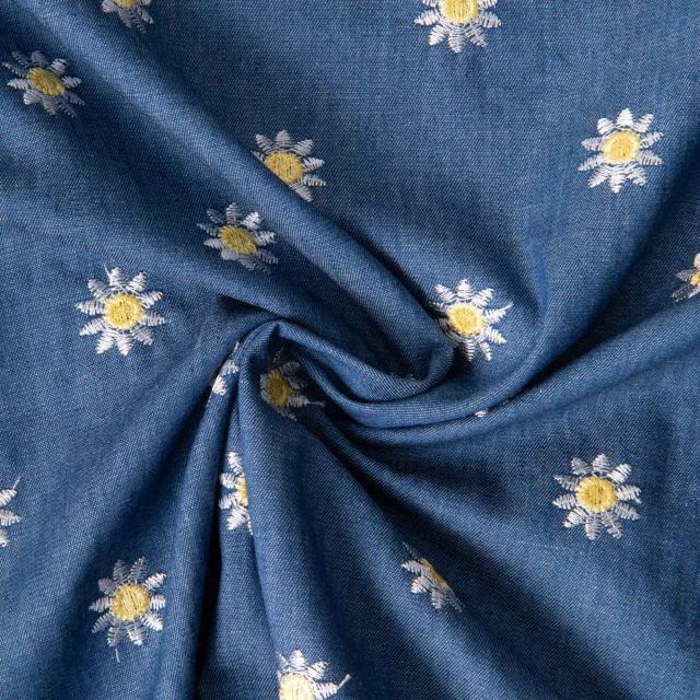 Tissu Chambray Coton brodé Soleil sur fond Bleu denim