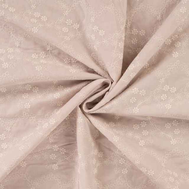 Tissu Voile de coton brodé Fleurs délicates sur fond Beige sable