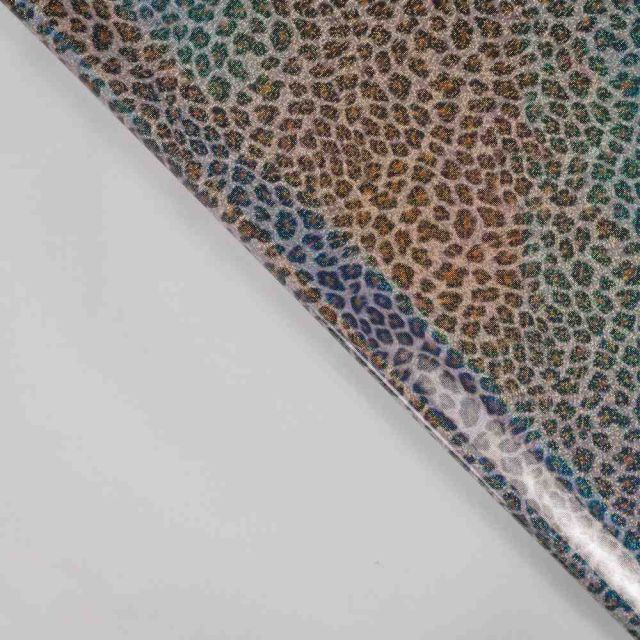 Tissu Imperméable Lunaria irisé motif léopard sur fond Transparent