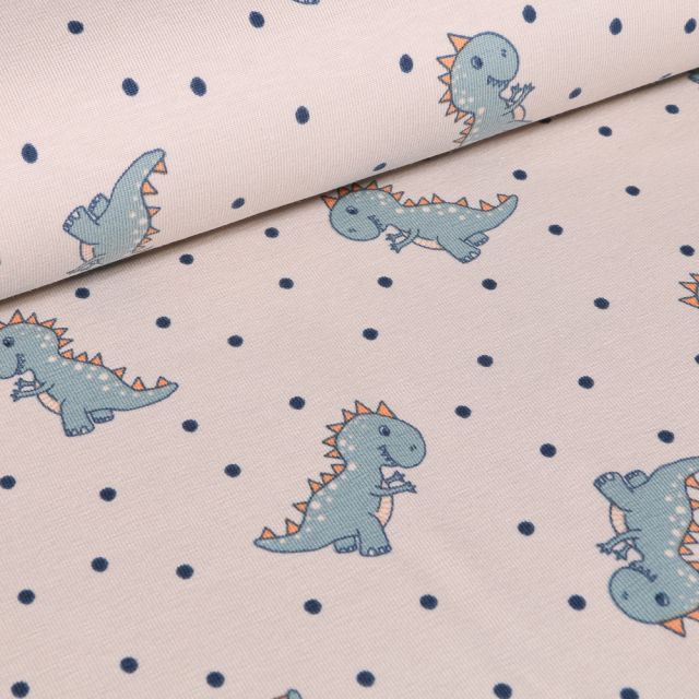 Tissu Jersey Coton Baby Dino sur fond Blanc cassé