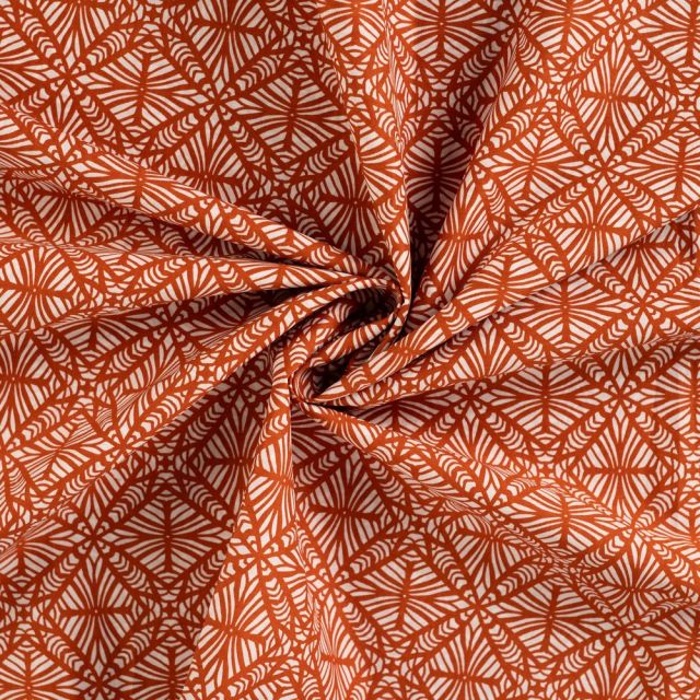 Tissu Voile de Coton Graphique Hypnotique sur fond Terracotta