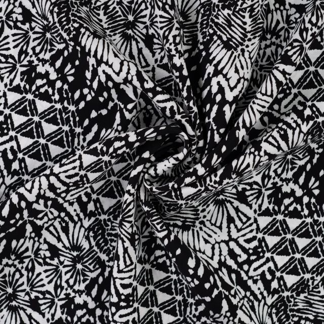 Tissu Viscose imprimé Motifs blancs destructurés sur fond Noir