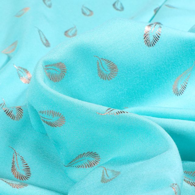 Tissu Viscose légère Plumes métallisées sur fond Bleu turquoise