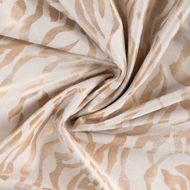 Tissu Suédine extensible Lyra aspect daim  motif zèbre Doré sur fond Beige sable