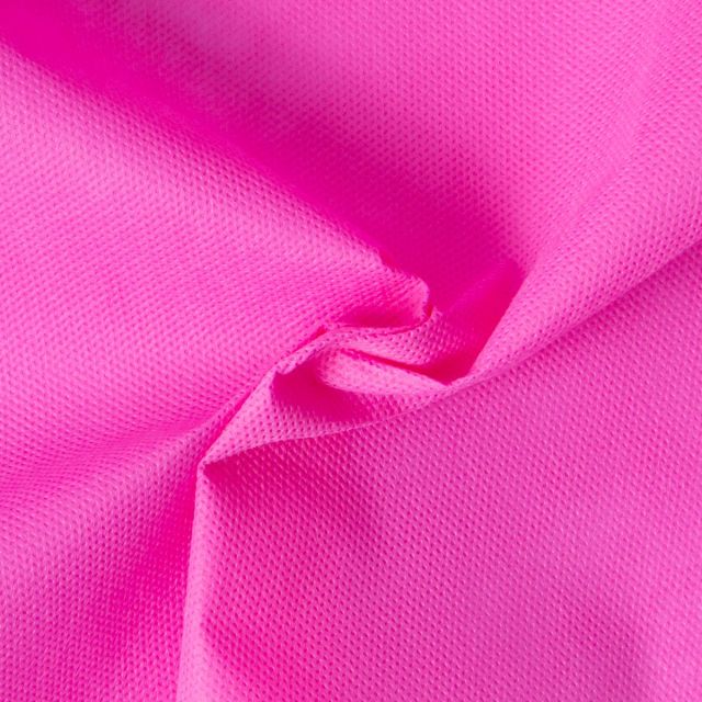 Tissu Fiesta Non tissé déperlant uni Rose fuchsia