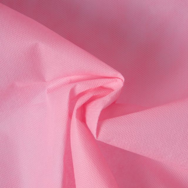 Tissu Fiesta Non tissé déperlant uni Rose