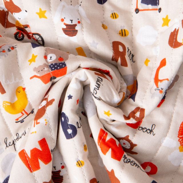 Tissu Coton Matelassé réversible Ray alphabet coloré et pois sur fond Ecru