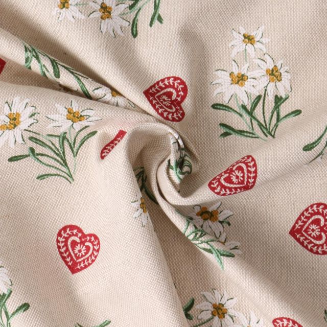 Tissu Toile de Coton Almina coeur et edelweiss sur fond Beige