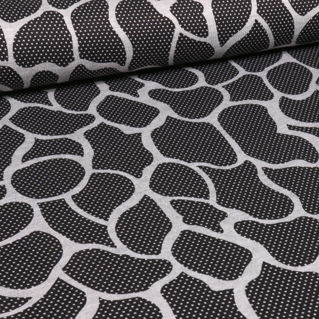 Tissu Jersey Milano Alvéoles blanches sur fond Noir - Par 10 cm