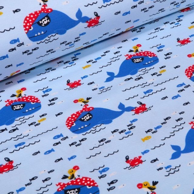 Tissu Jersey Coton envers gratté Baleines pirates sur fond Bleu ciel - Par 10 cm
