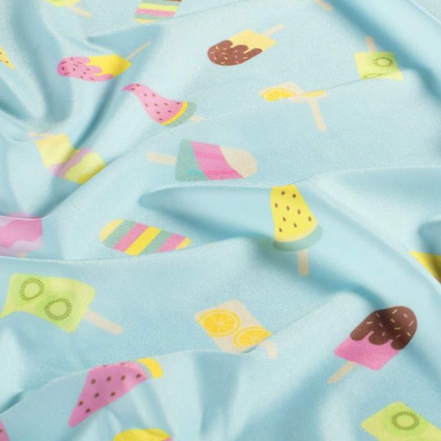 Coupon Tissu Lycra maillot de bain Fizzy sur fond Bleu pastel - Coupon de 100 cm