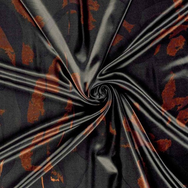 Tissu Satin imprimé Zeyna camouflage artistique Ocre sur fond Noir