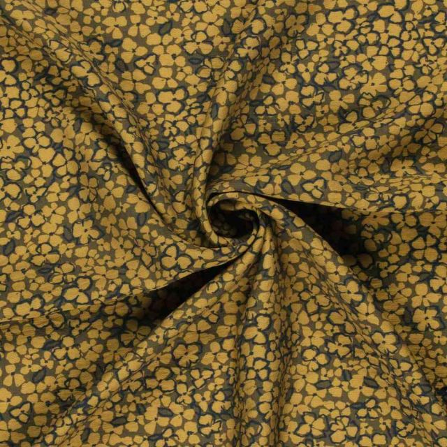 Tissu Crêpe de Viscose Ambrine fleurs Moutarde dorée sur fond Noir