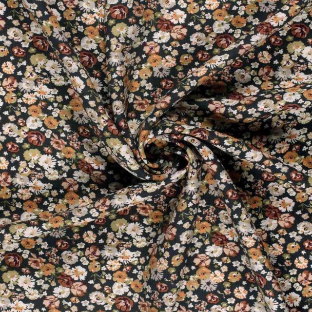 Tissu Crêpe de Viscose Bérengère fleurs Blanches sur fond Noir