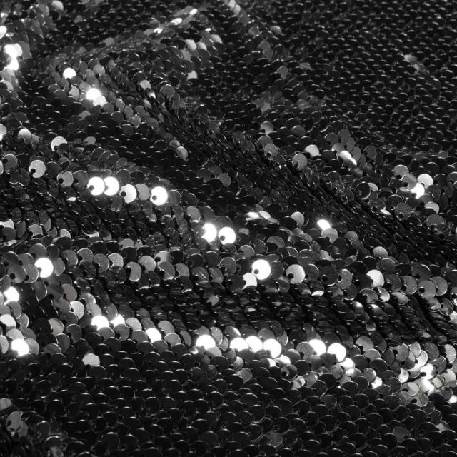Tissu Sequins magique  Luxa extensible  sequins Argentés sur fond Noir