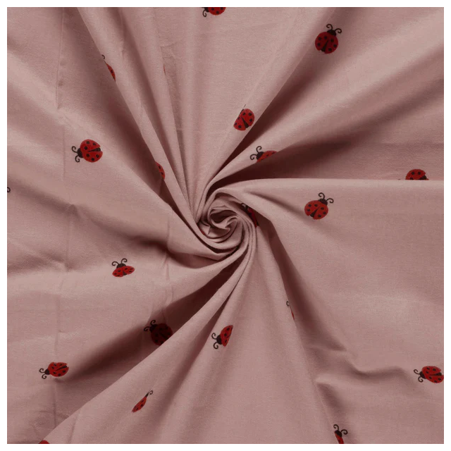 Tissu Flanelle de Coton Léonie coccinelles Rouges sur fond Rose poudré