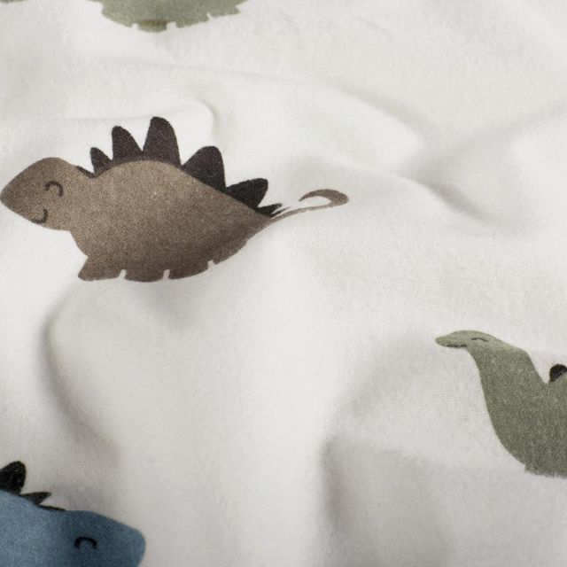 Tissu Flanelle de Coton Zoé dinos Kaki, Brun et Bleu sur fond Ecru