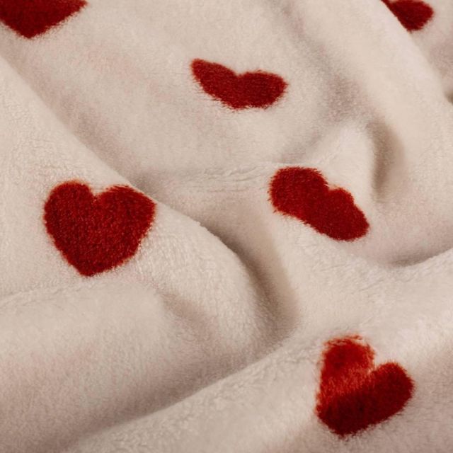 Tissu Fausse fourrure Isaé envers doudou coeurs Rouges sur fond Ecru