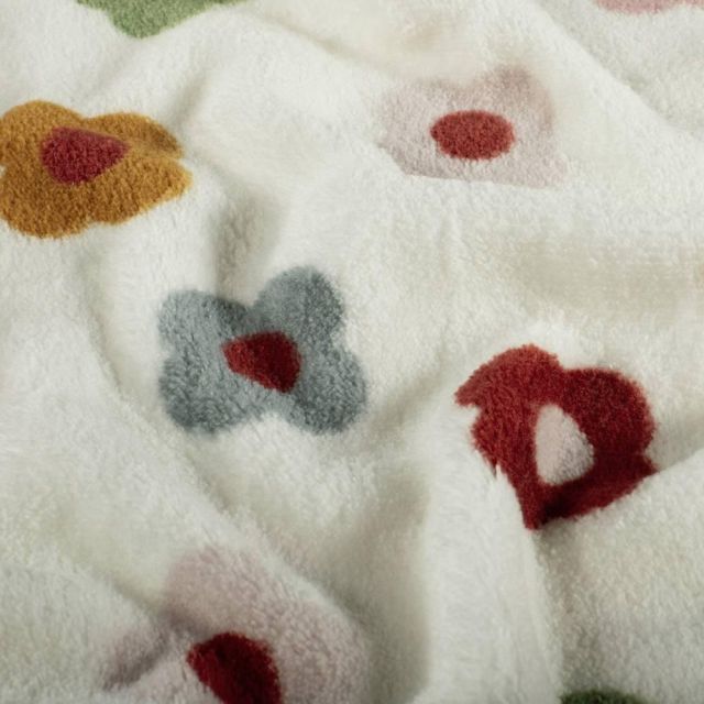 Tissu Fausse fourrure Maya envers doudou fleurs Multicolores sur fond Blanc cassé
