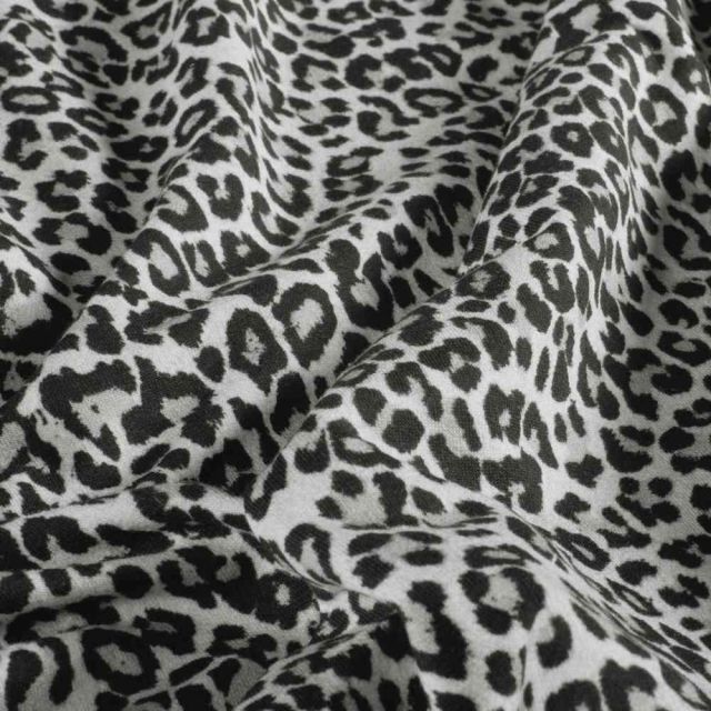 Tissu Sweat léger French Terry Maïa extensible léopard Noir sur fond Blanc