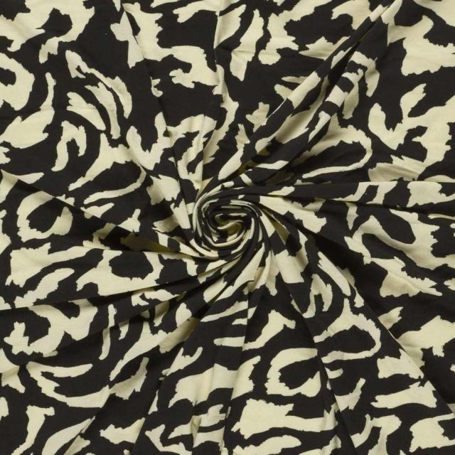 Tissu Jersey Viscose digital animalier stylisé Ivoire sur fond Noir