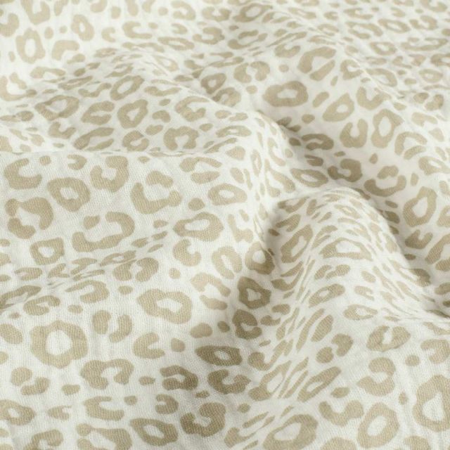 Tissu Double gaze de Coton motif panthère Beige sur fond Blanc cassé