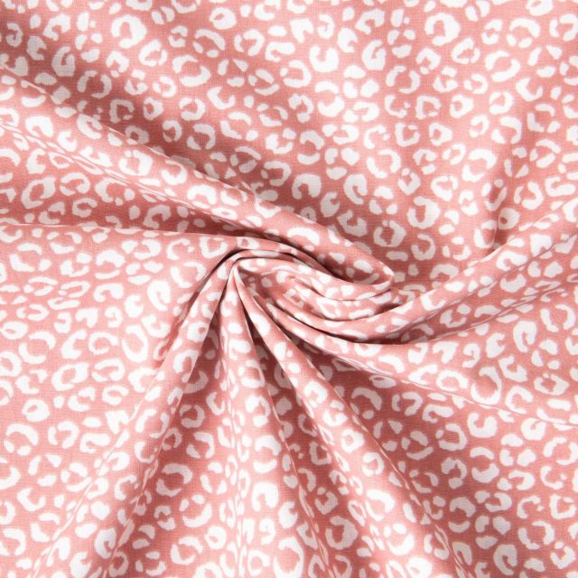 Tissu Coton imprimé Léa motifs léopard Ecru sur fond Rose poudré