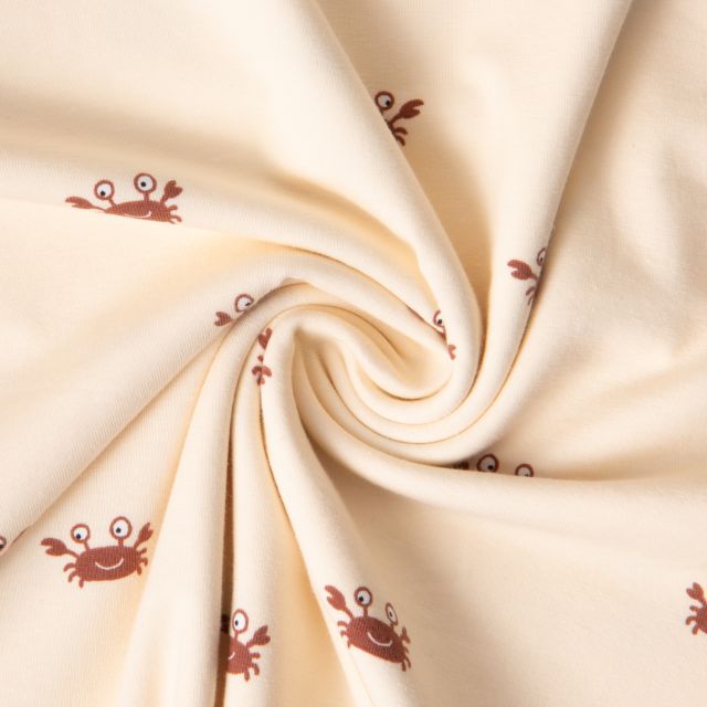 Tissu Jersey Coton imprimé crabes sur fond Beige