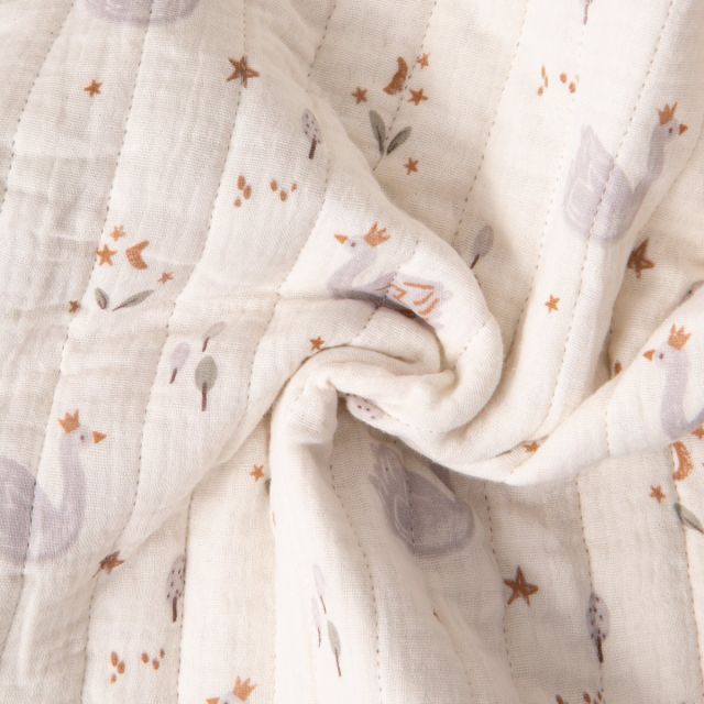 Tissu Matelassé Double gaze réversible Luna cygnes Gris lavande sur fond Blanc cassé