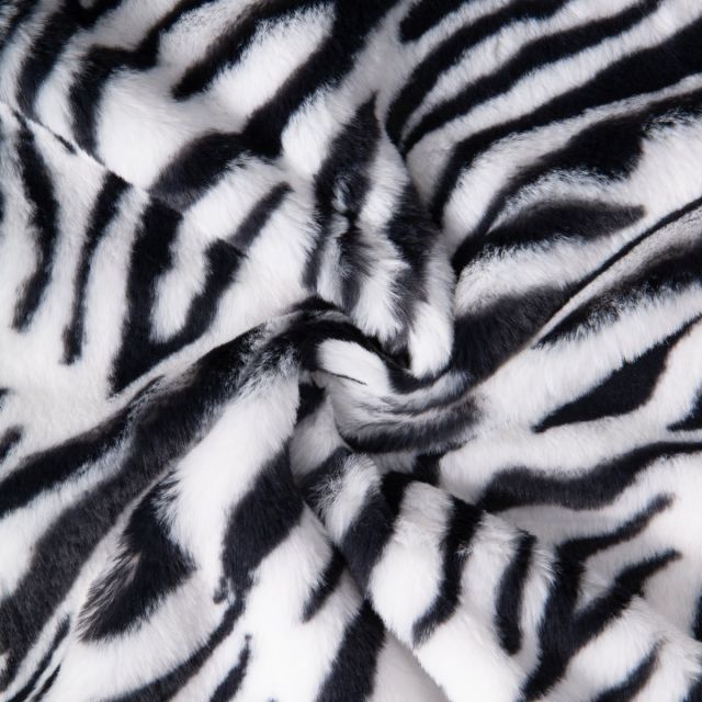 Tissu Fausse fourrure Léna Zébré Noir sur fond Blanc