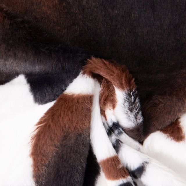 Tissu Fausse fourrure Léna Tacheté noir et marron sur fond Blanc