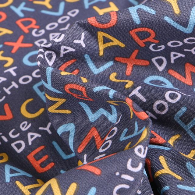 Tissu Coton imprimé Arty Lettres multicolores sur fond Bleu denim