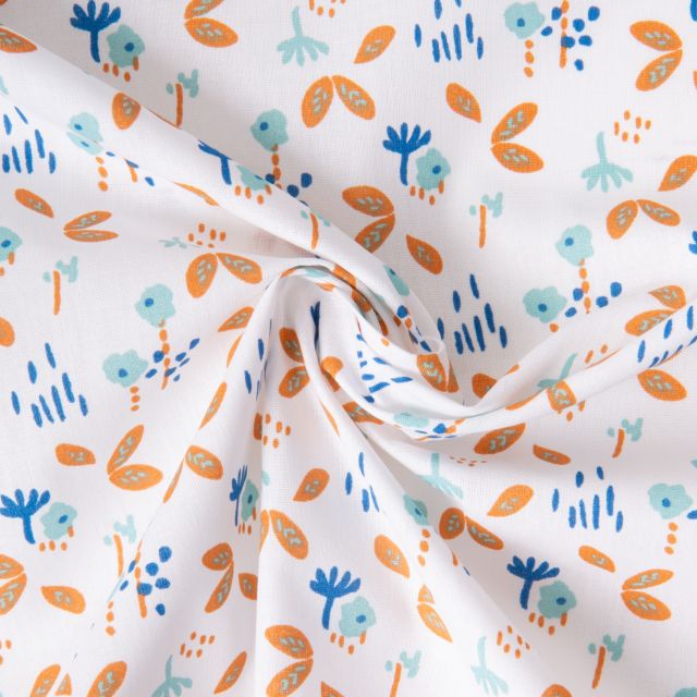 Tissu Coton imprimé Fuzy motifs fleuris bleus et orange sur fond Blanc