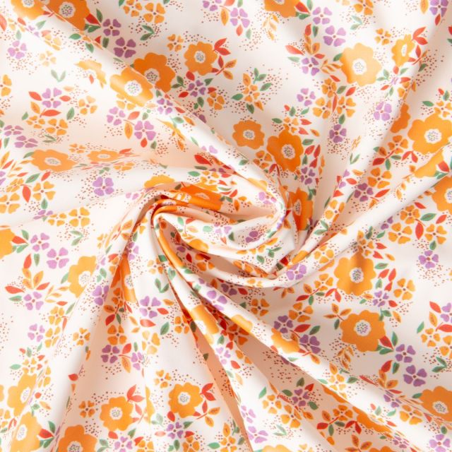 Tissu Imperméable déperlant Oxelis fleurs Orange et Violet sur fond Ecru