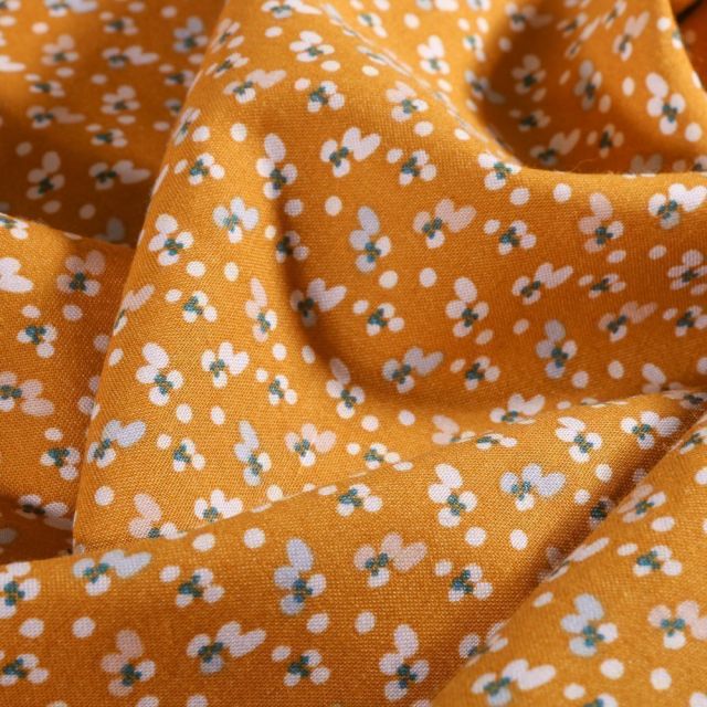 Tissu Viscose  Arty Mini fleurs blanches et ciel sur fond Ocre - Par 10 cm