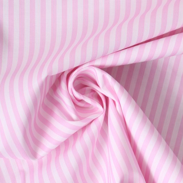 Tissu Coton imprimé  rayé Lisalou sur fond Rose bébé
