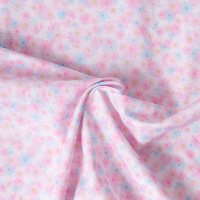 Tissu Popeline de Coton légère Fleurs roses pastel et bleues ciel pastel sur fond Blanc cassé